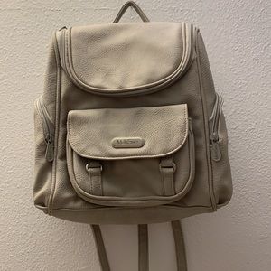 MultiSac handbag/backpack in tan PU leather,10”X12” with 8 pockets